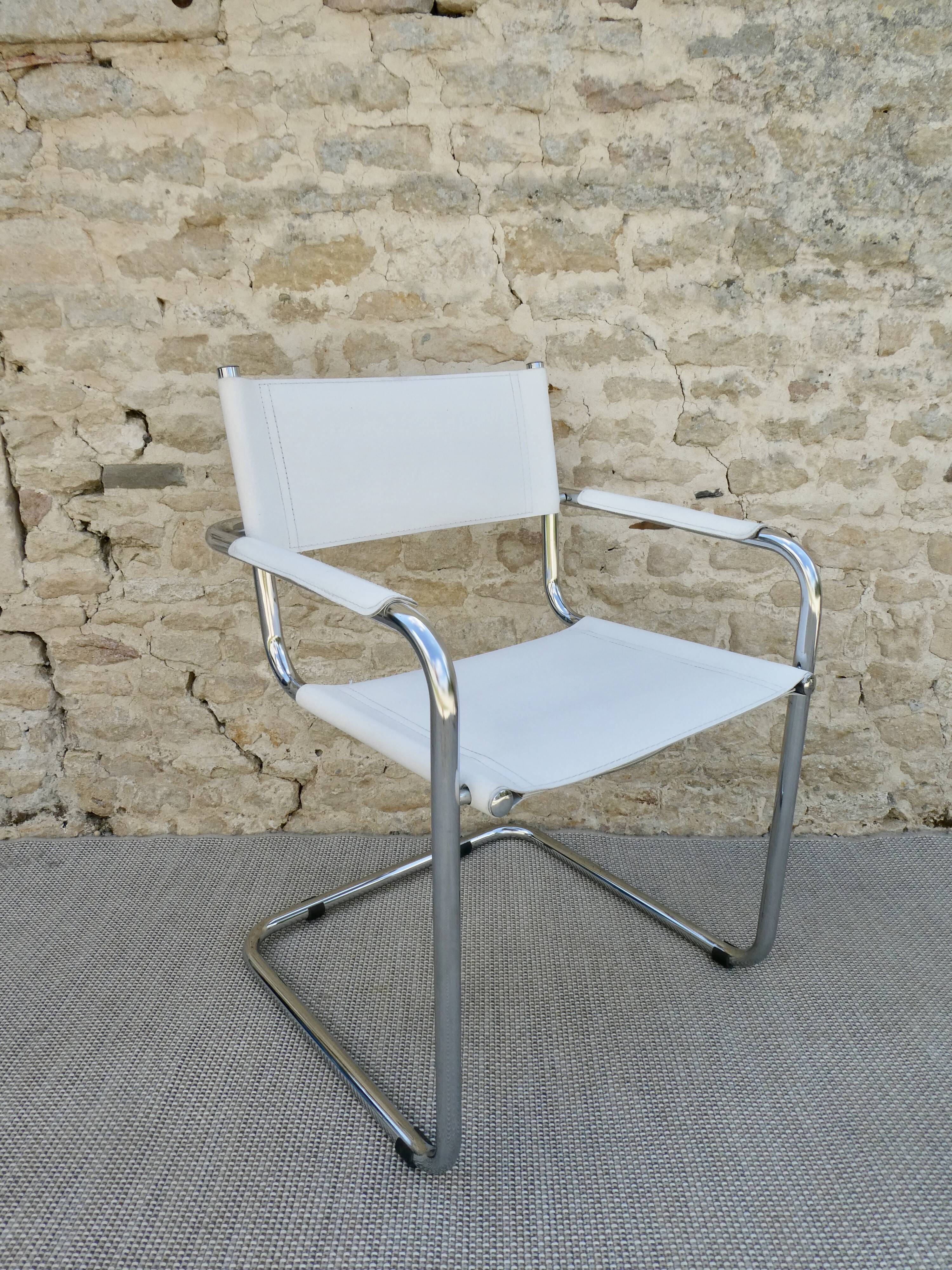 Armchair in chrome and leather