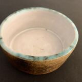 Round ashtray signed in sandstone with glazed interior