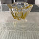 Vintage empty pocket ashtray in yellow chiseled glass or crystal