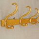 Wall coat rack with 4 hooks, around 1925, bent wood.