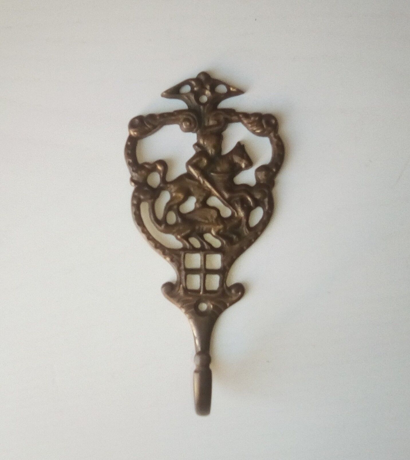 Old brass patère coat rack