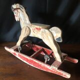 Cheval à bascule avec roulettes