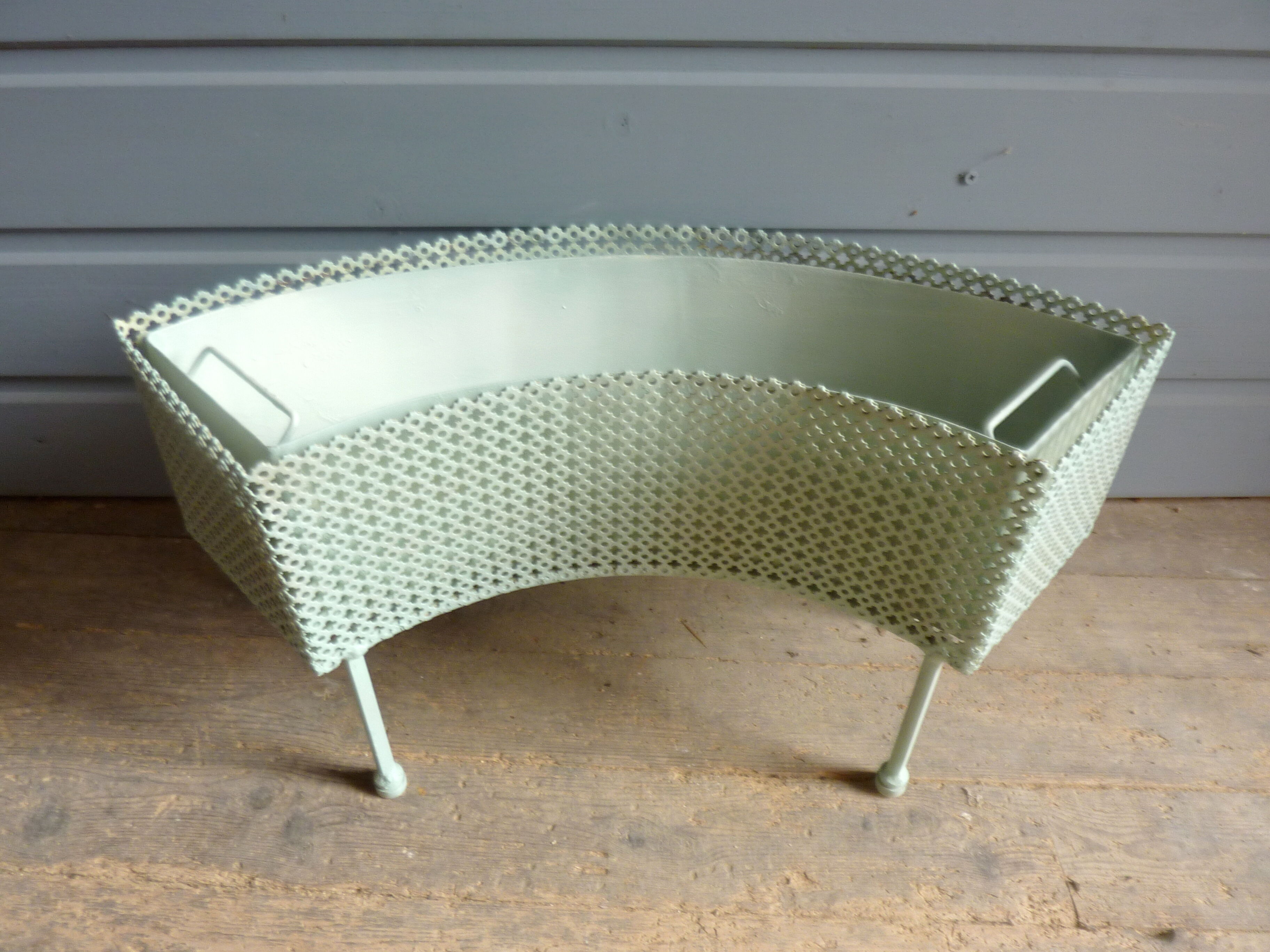 Perforated metal planter from the 1950s