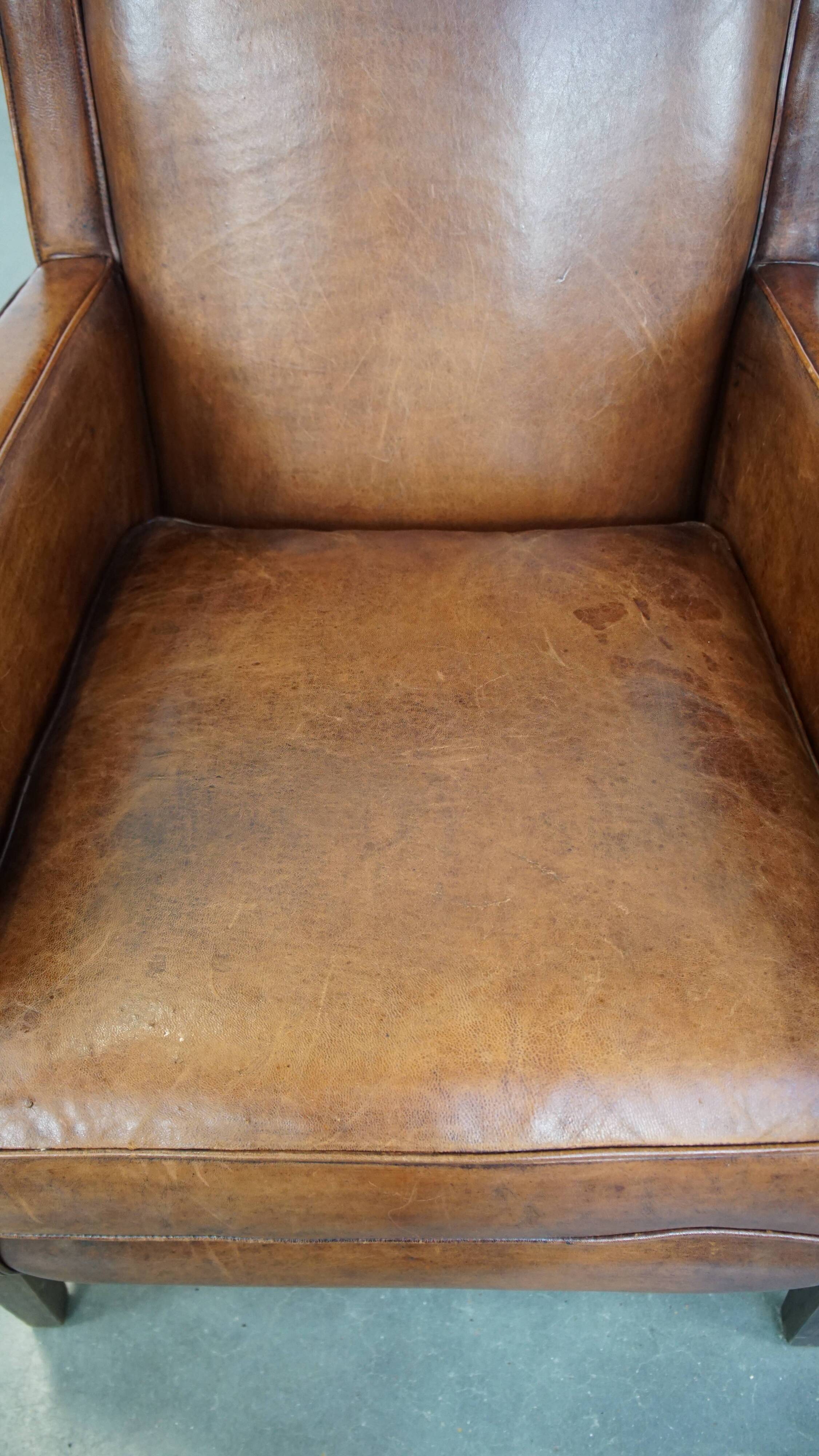 Sheepskin armchair with a refined Art Deco design