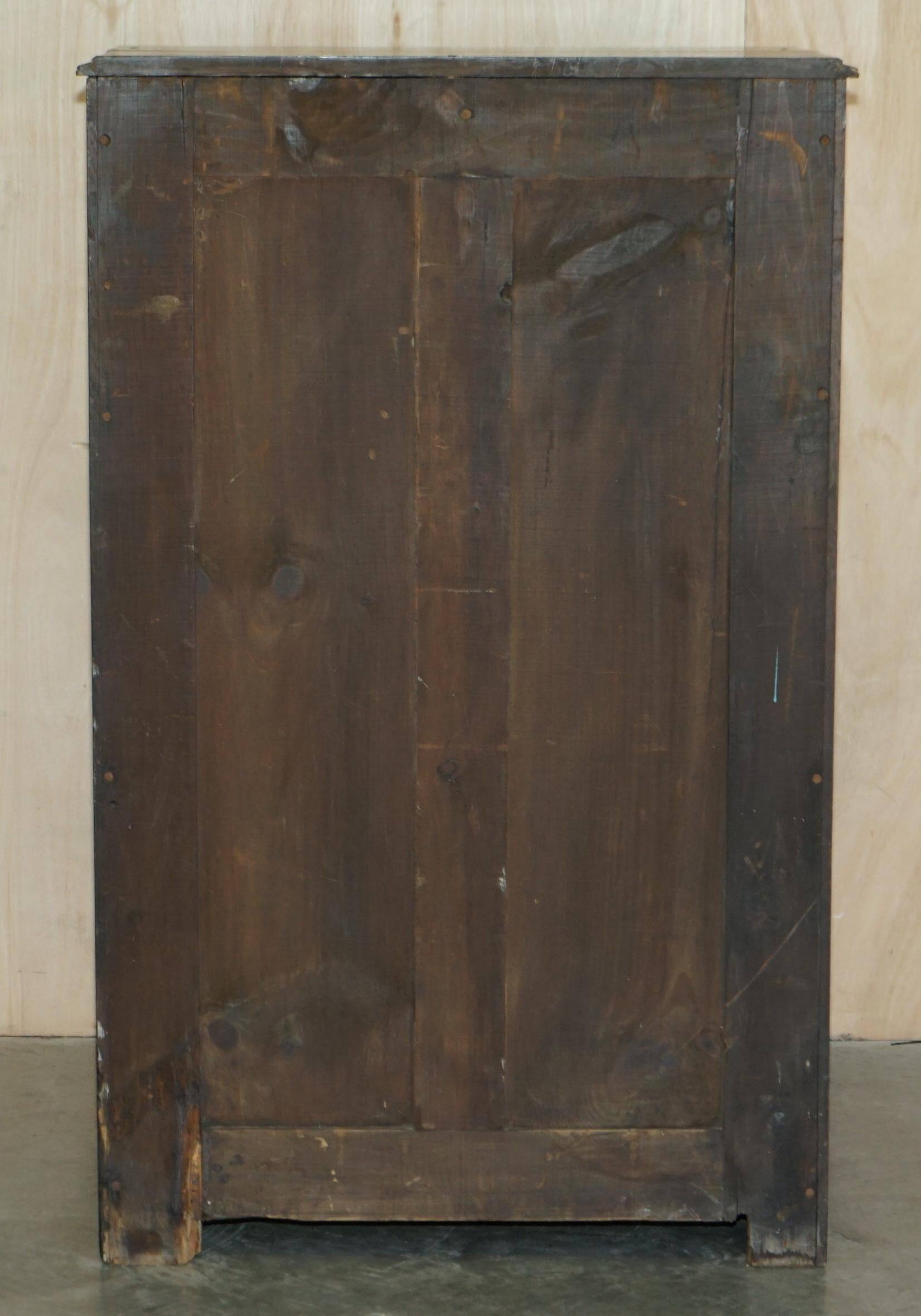 Victorian Wellington chest in figured elm by R Crosby & Son with 160 seal impressions.