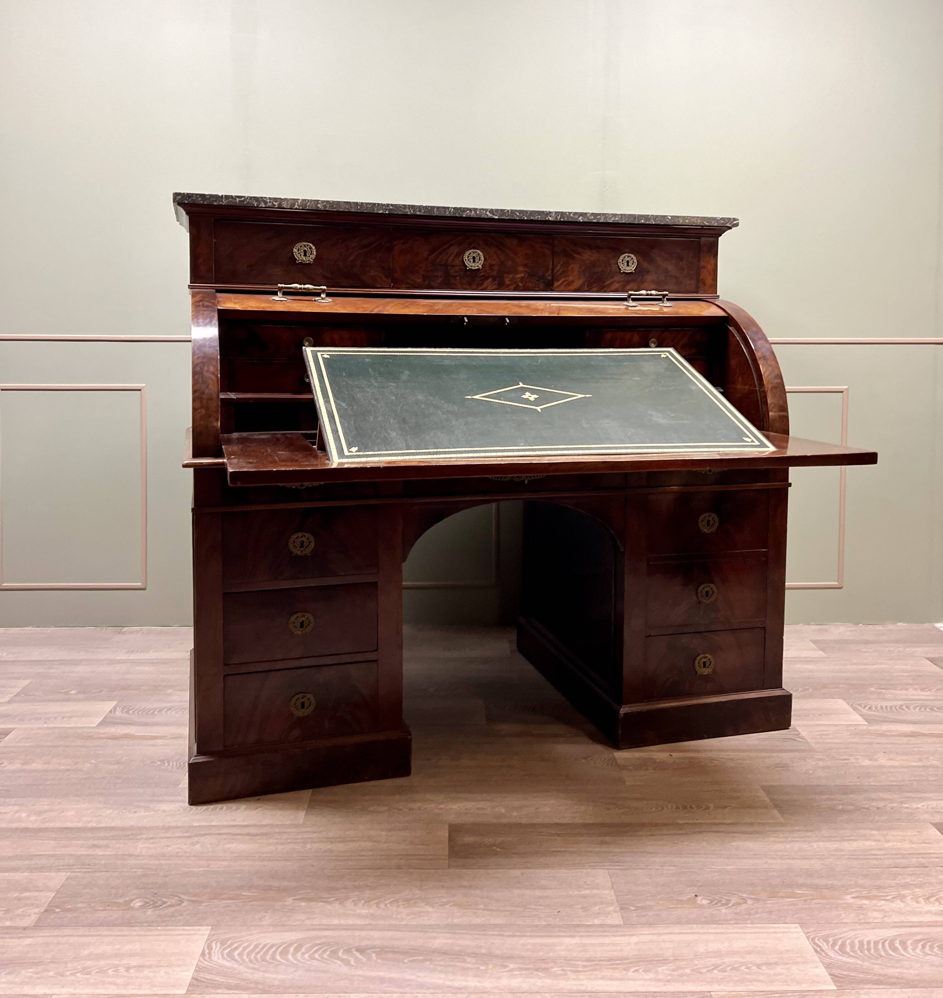 Cylinder desk in flamed mahogany empire style 19th century