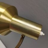 Older Swedish table lamp, estimated 1980s, in gold-colored aluminum with “bend”.