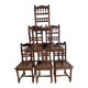 6 carved wooden chairs with cane seats