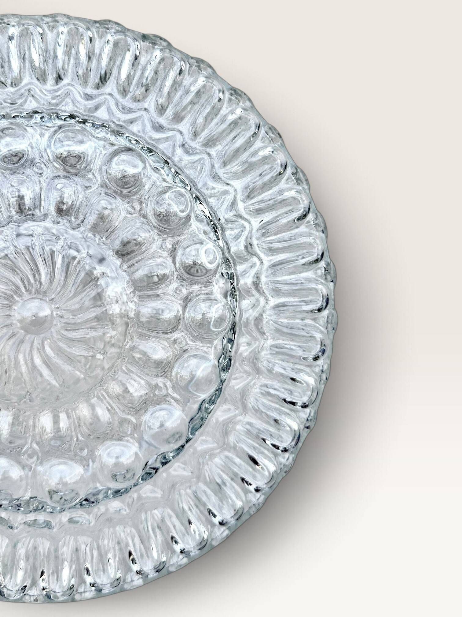 Set of three round wall/ceiling lights in moulded glass.