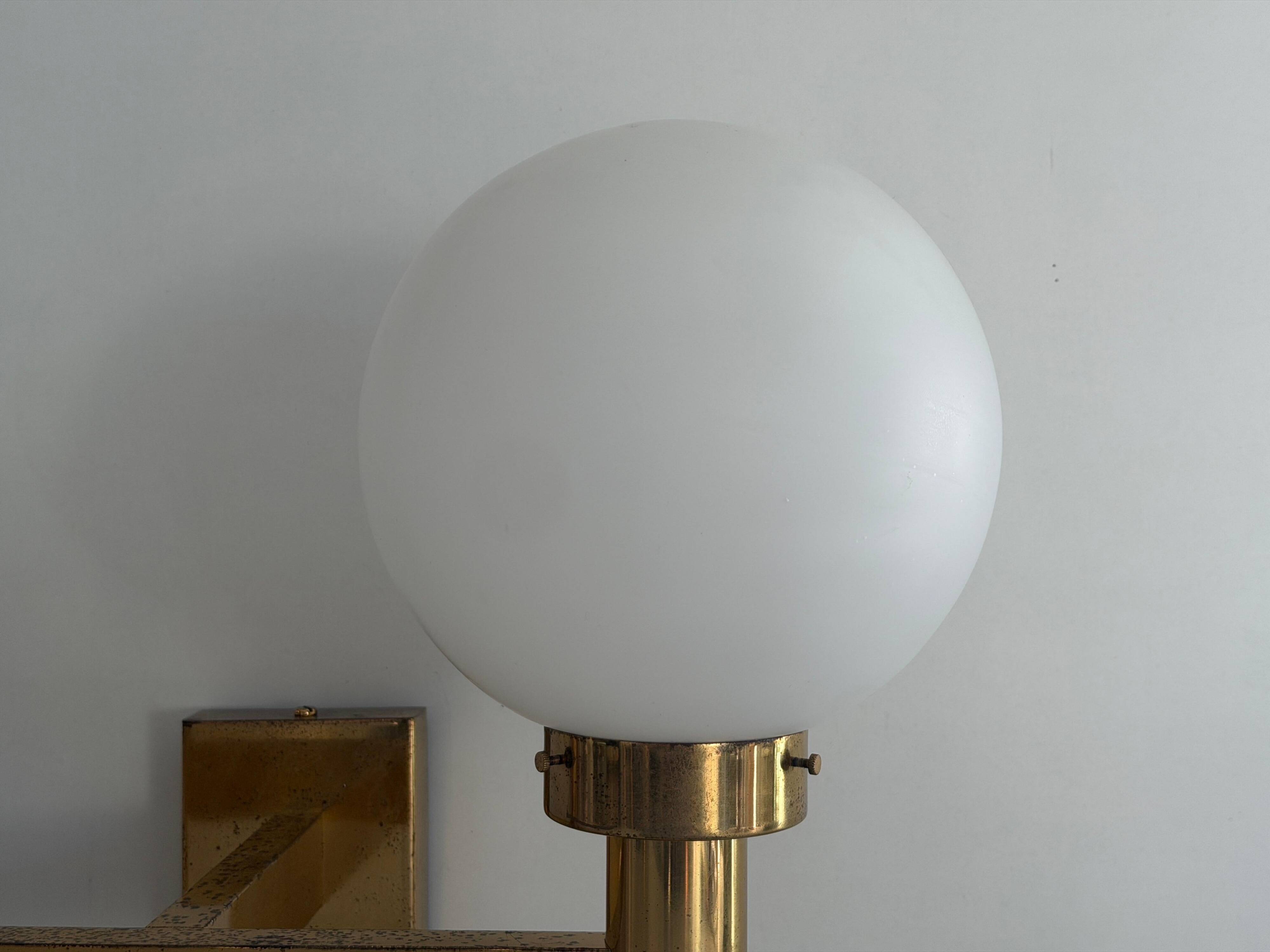 Double opal glass and heavy brass, large minimalist cinema wall light, 1960s, Germany
