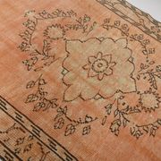 Tapis vintage rose poudré fait main en laine, style oriental doux