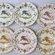 Set of 6 earthenware plates from Moustiers, featuring birds and flowers.