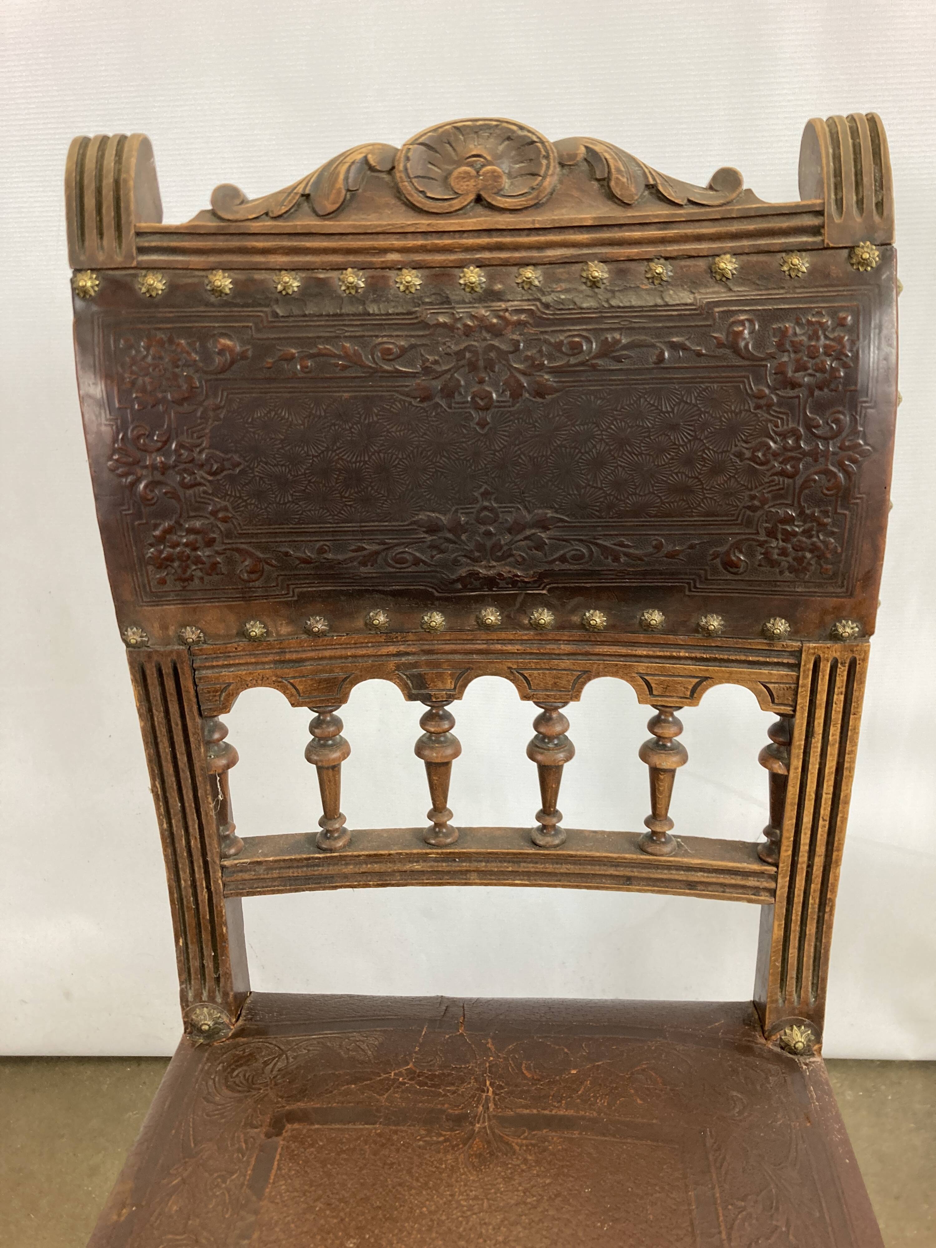 Pair of Henry II wooden and leather chairs