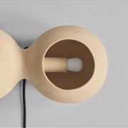 Table lamp or wall lamp in sand color made of ceramic, contemporary work.