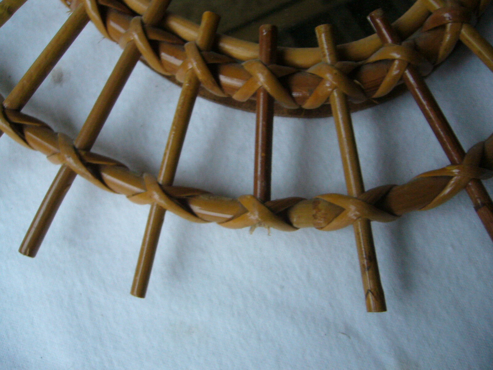 Vintage oval mirror in rattan