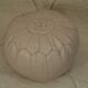 Beige leather Moroccan pouf