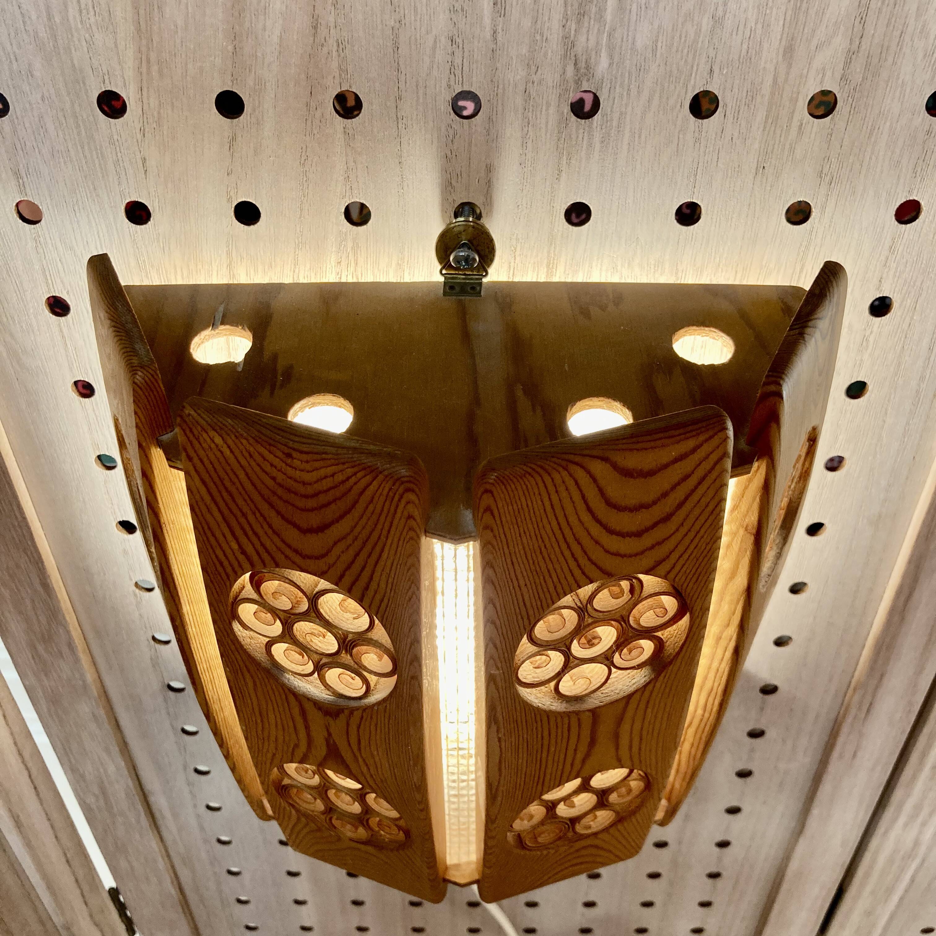 A pair of large scandinavian design wall lights from the 1950s.