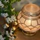 Vintage Art Deco globe table lamp in pink and gold glass.