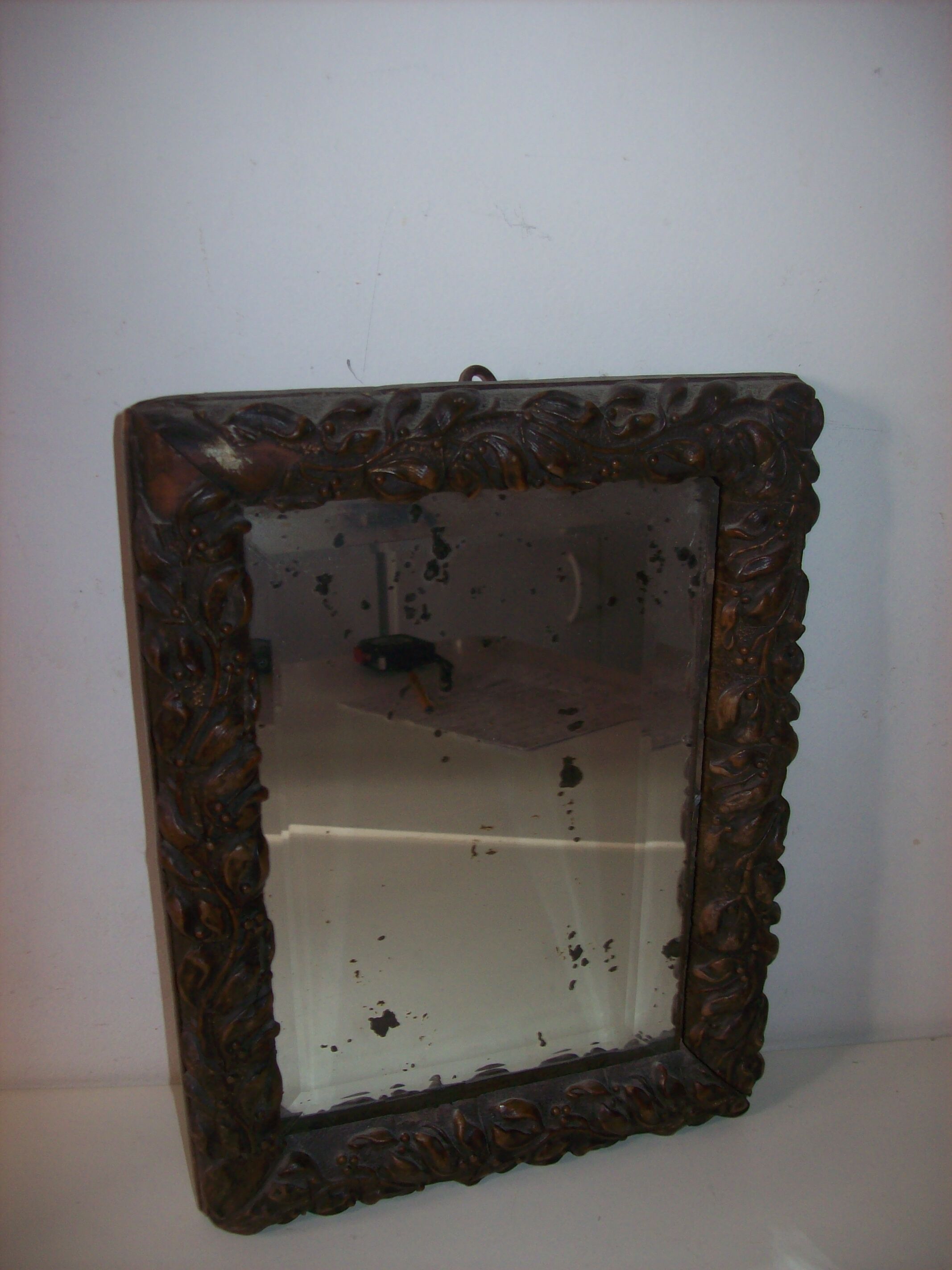 Antique mirror in beveled glass