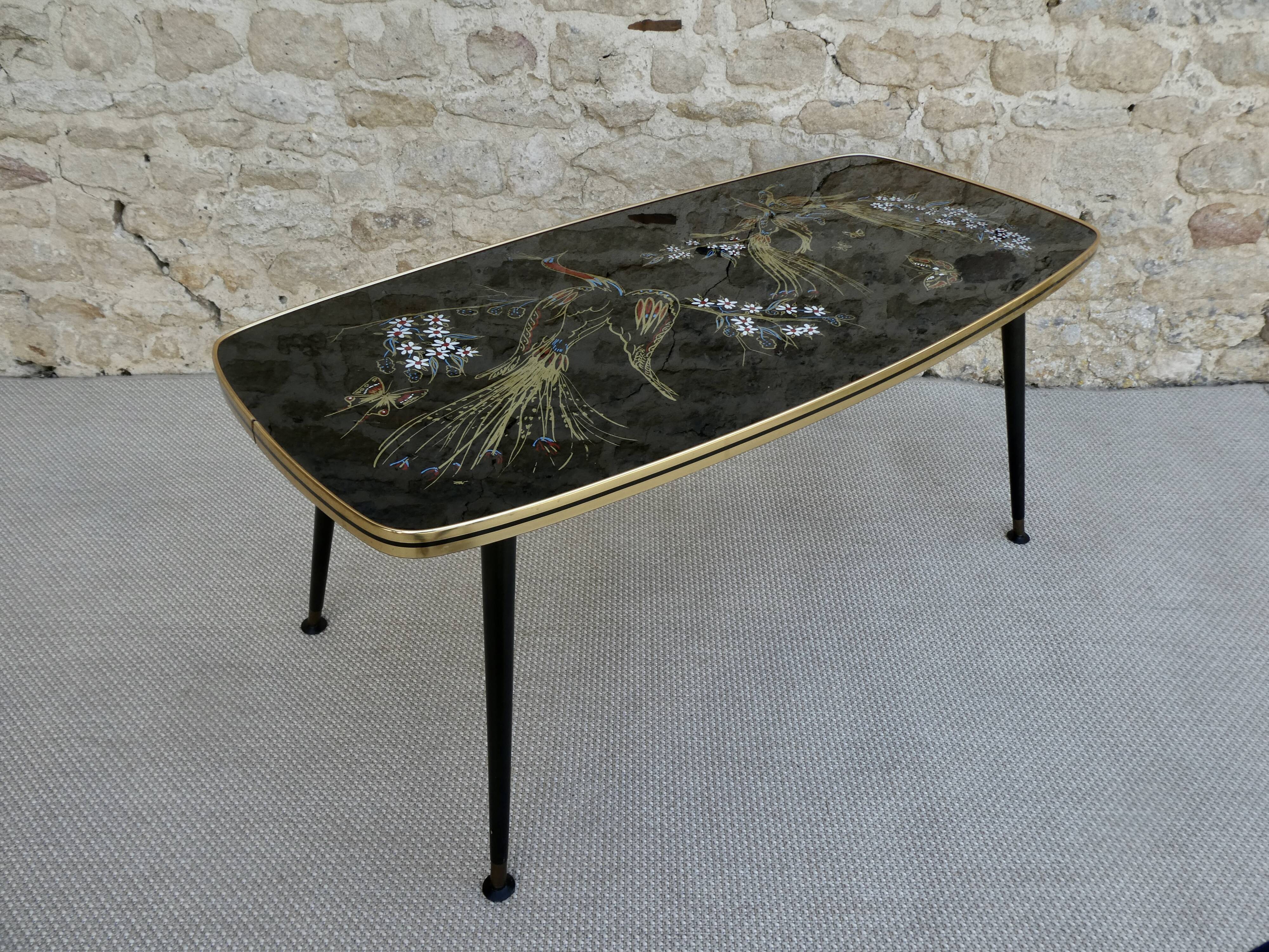 Coffee table from the 50s, tropical bird decor