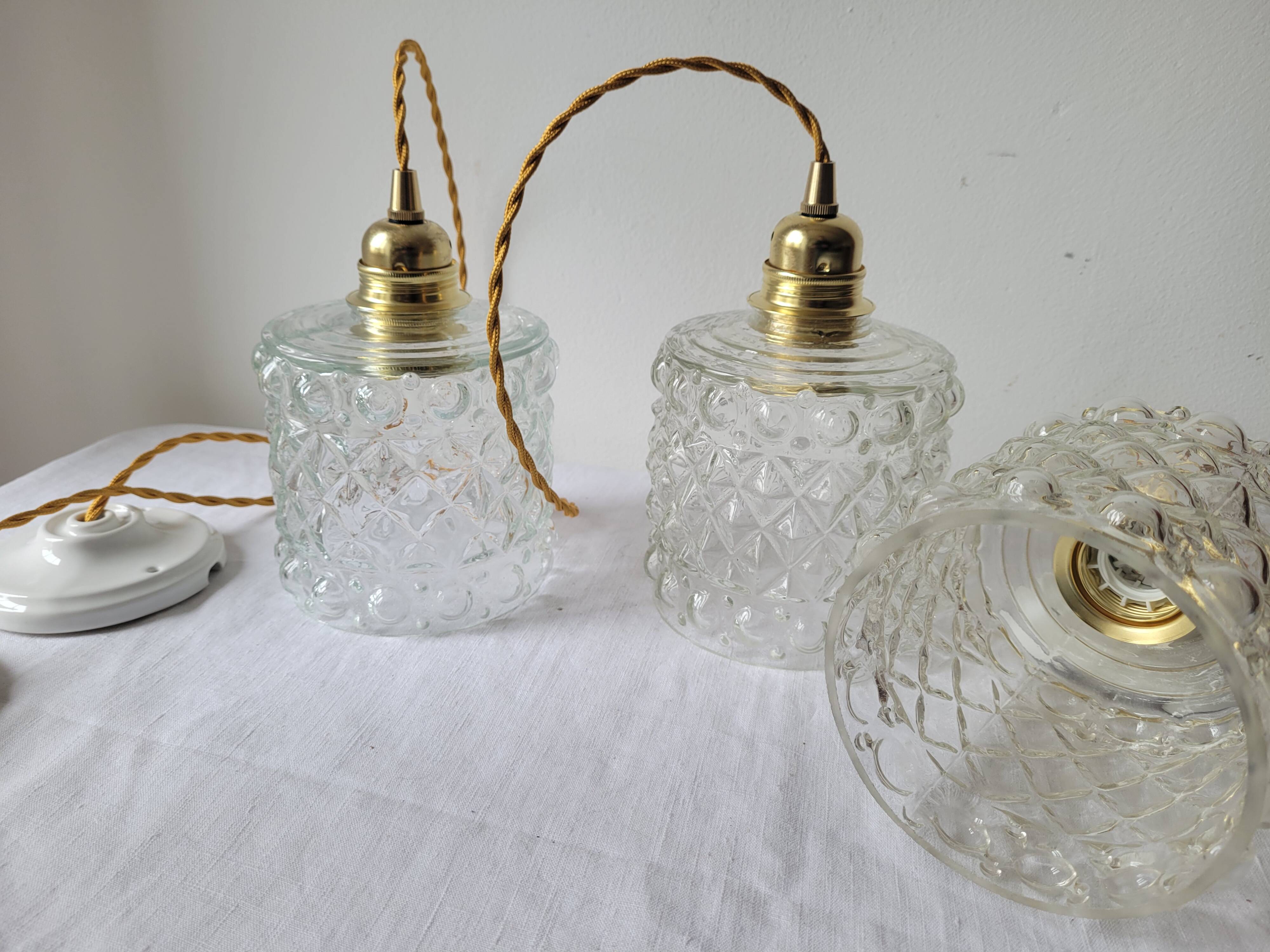 Trio of molded glass pendant lights