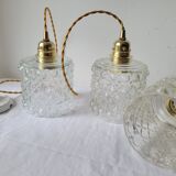 Trio of molded glass pendant lights