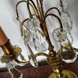 Pair of bronze girandoles with crystal pendants, two arms of lights.