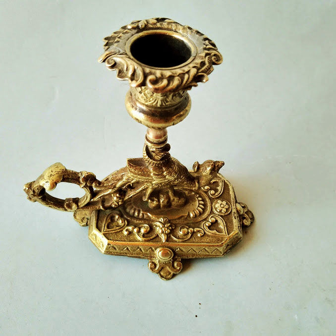 Bronze cellar rat candlestick