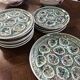 Set of 12 plates and an oyster dish or other in majolica.