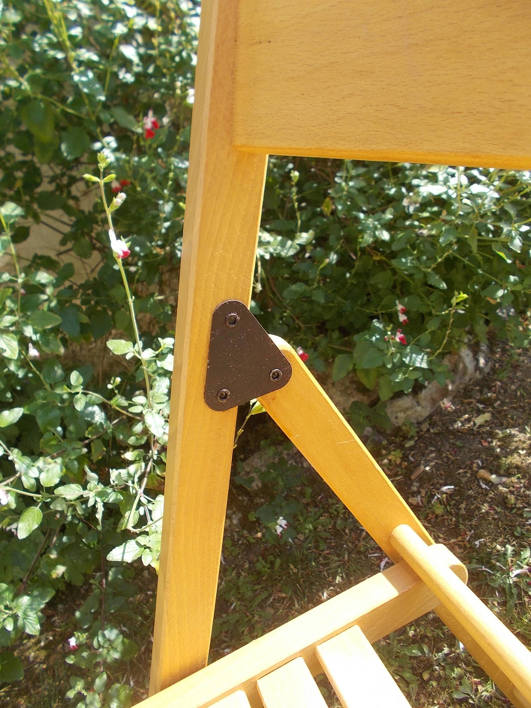 pair of vintage wooden folding chairs