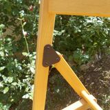 pair of vintage wooden folding chairs