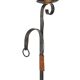 Wrought iron and leather floor lamp in the style of Jean-Pierre Ryckaert.