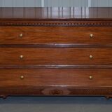 Set of hardwood dressers with finely carved bases.