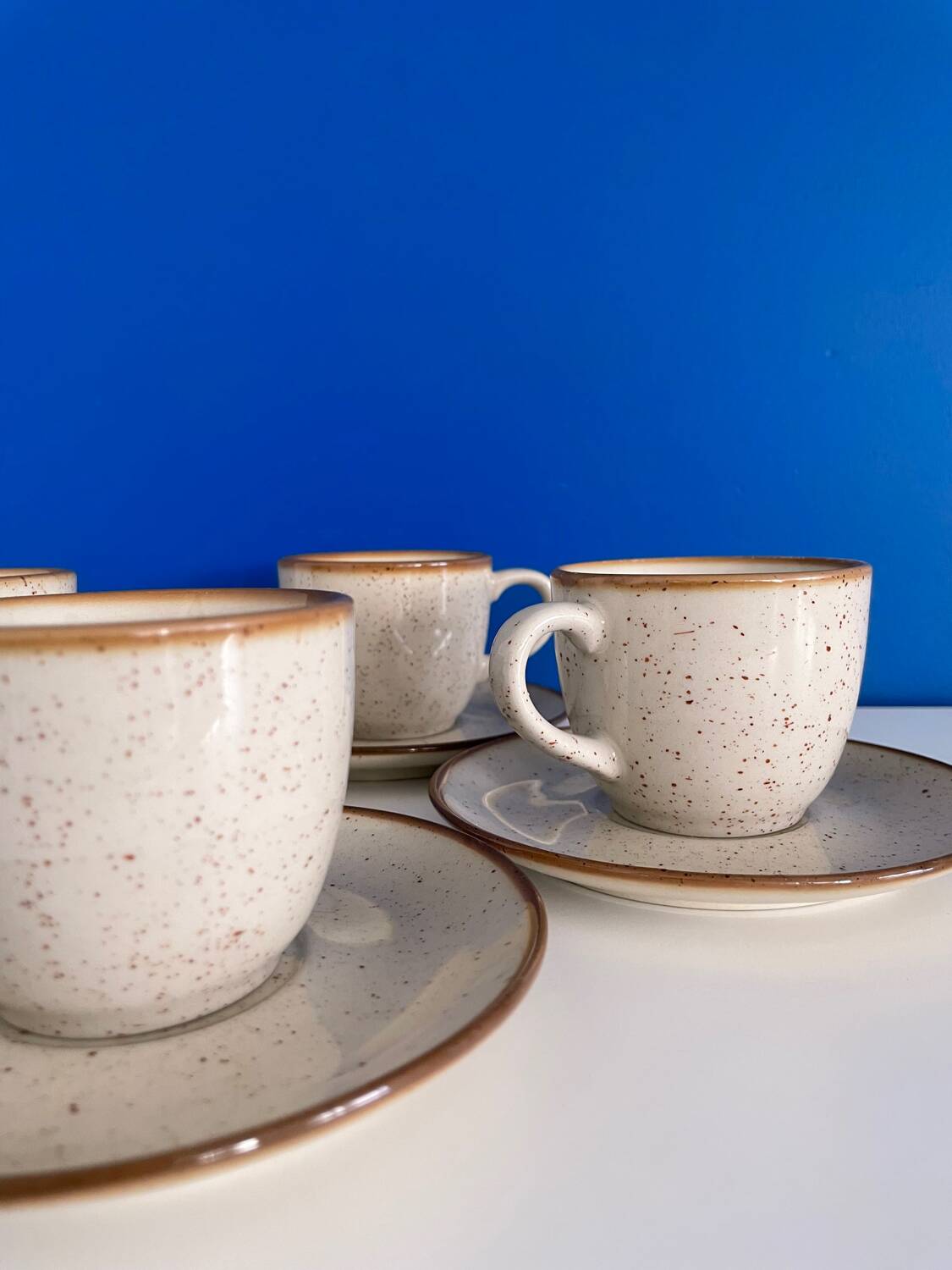 Speckled beige cup and saucer coffee set