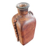 Carafe covered with leather