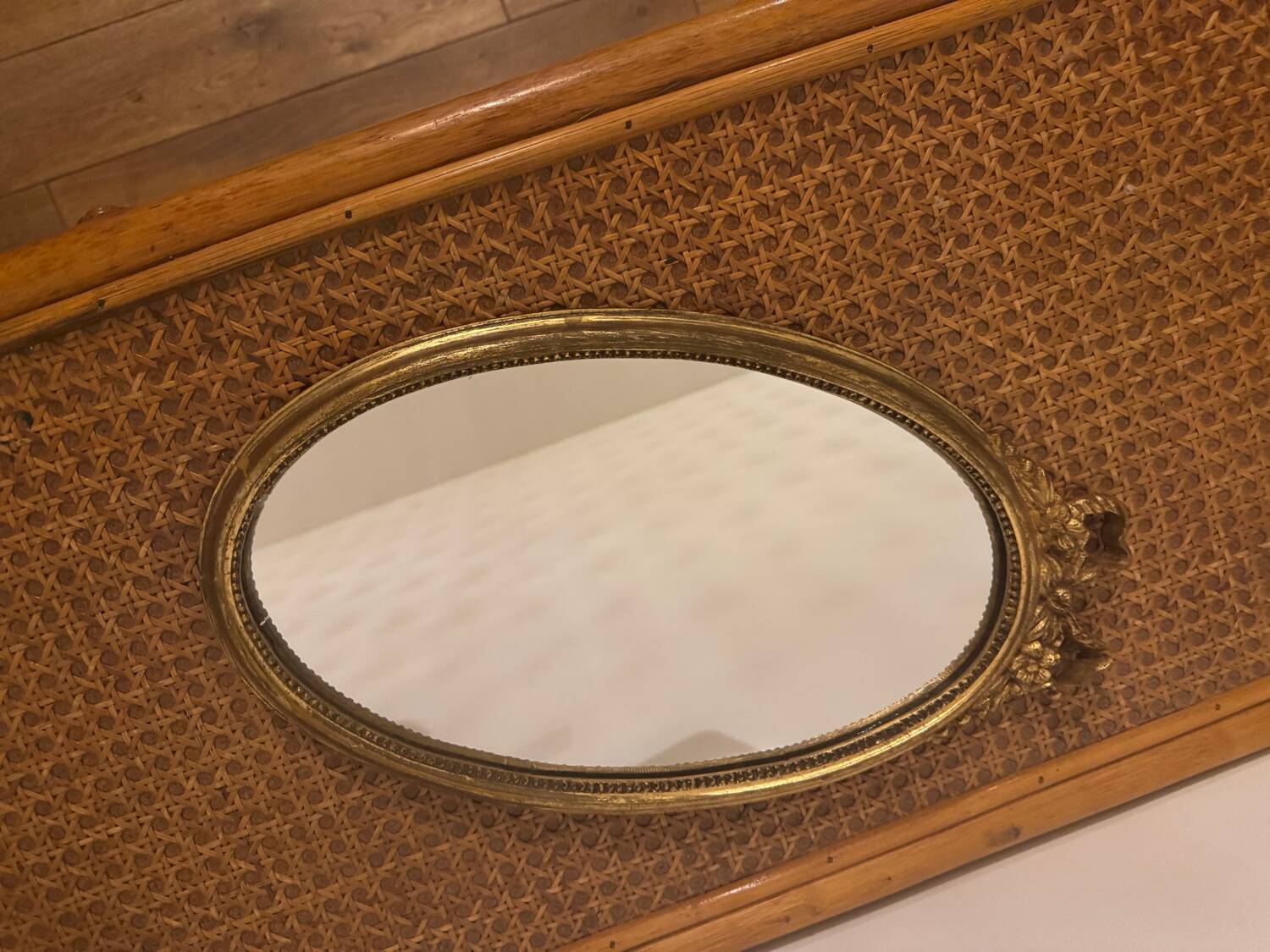Oval gold knot mirror