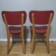 Two vintage chairs wood and mottled red vinyl