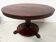 Empire style round table with claw feet, 19th century.