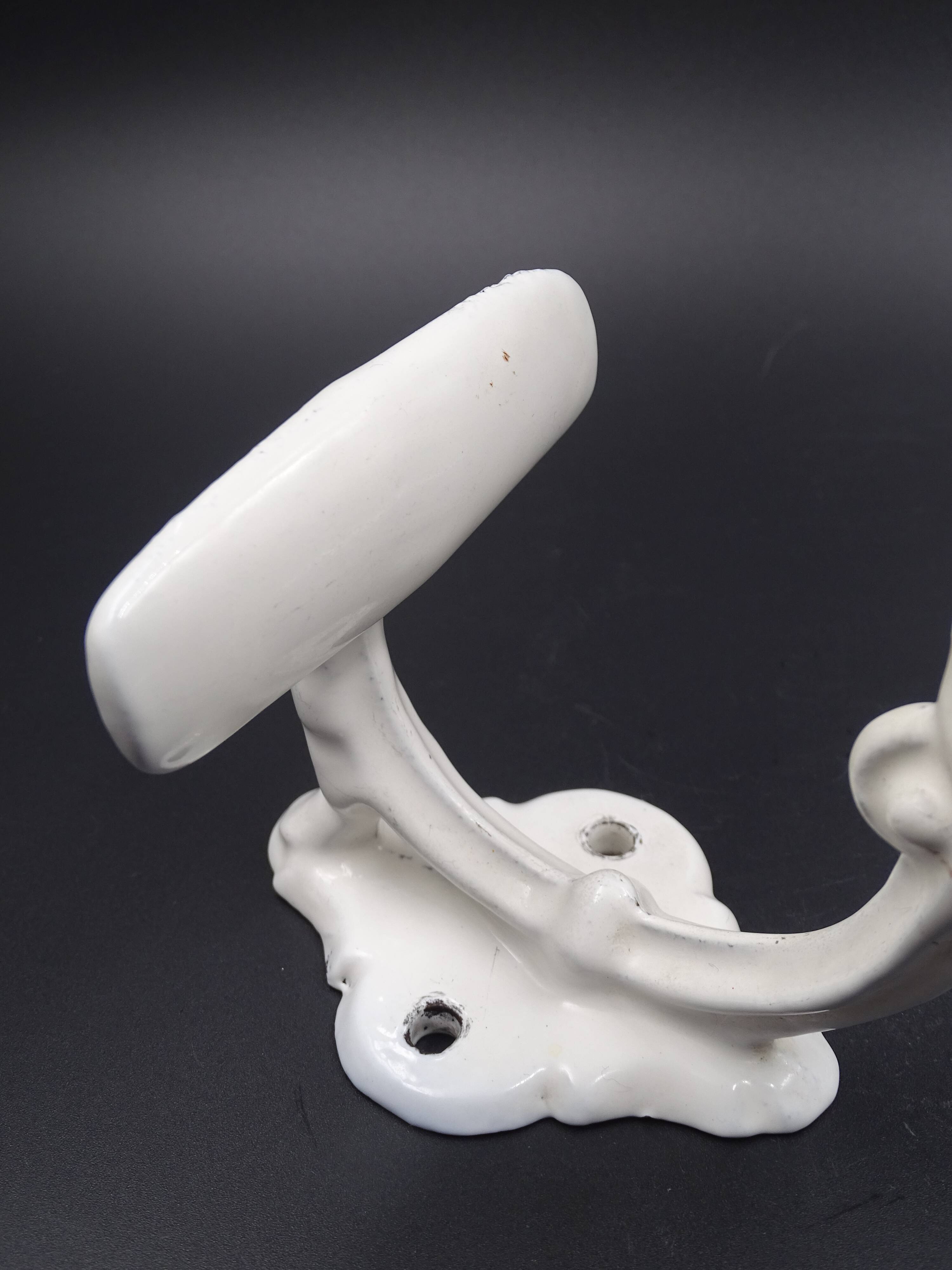 Old white enamelled metal patère