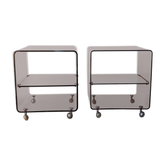 Pair of vintage smoked plexiglass bedside tables or accent furniture.