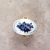 Trio of porcelain pillboxes