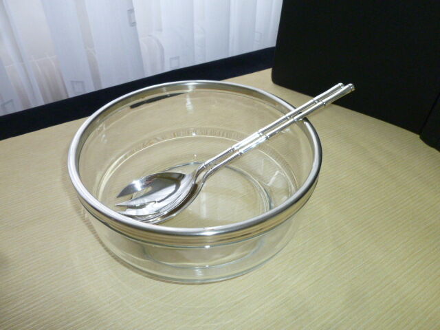 Salad bowl and silver-plated cutlery