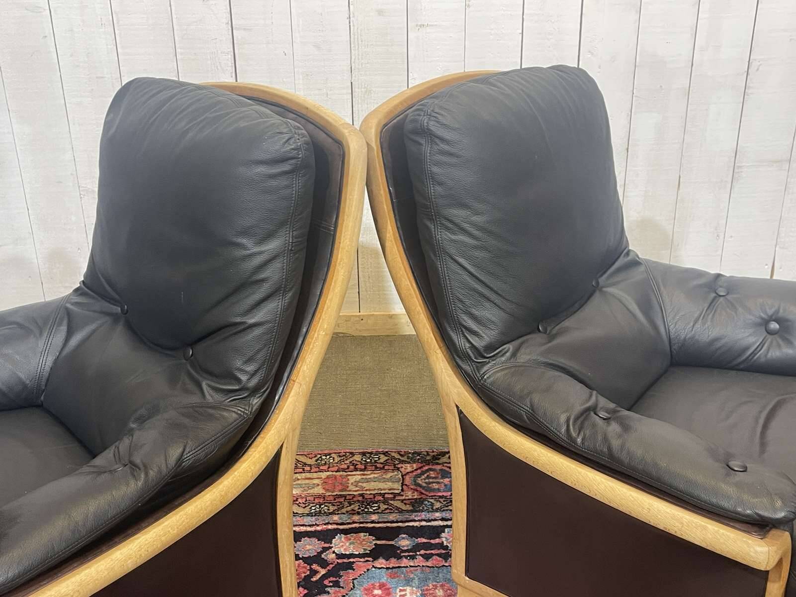 Pair of leather and beech armchairs from the 1970s.