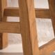 Round side table in antique solid wood
