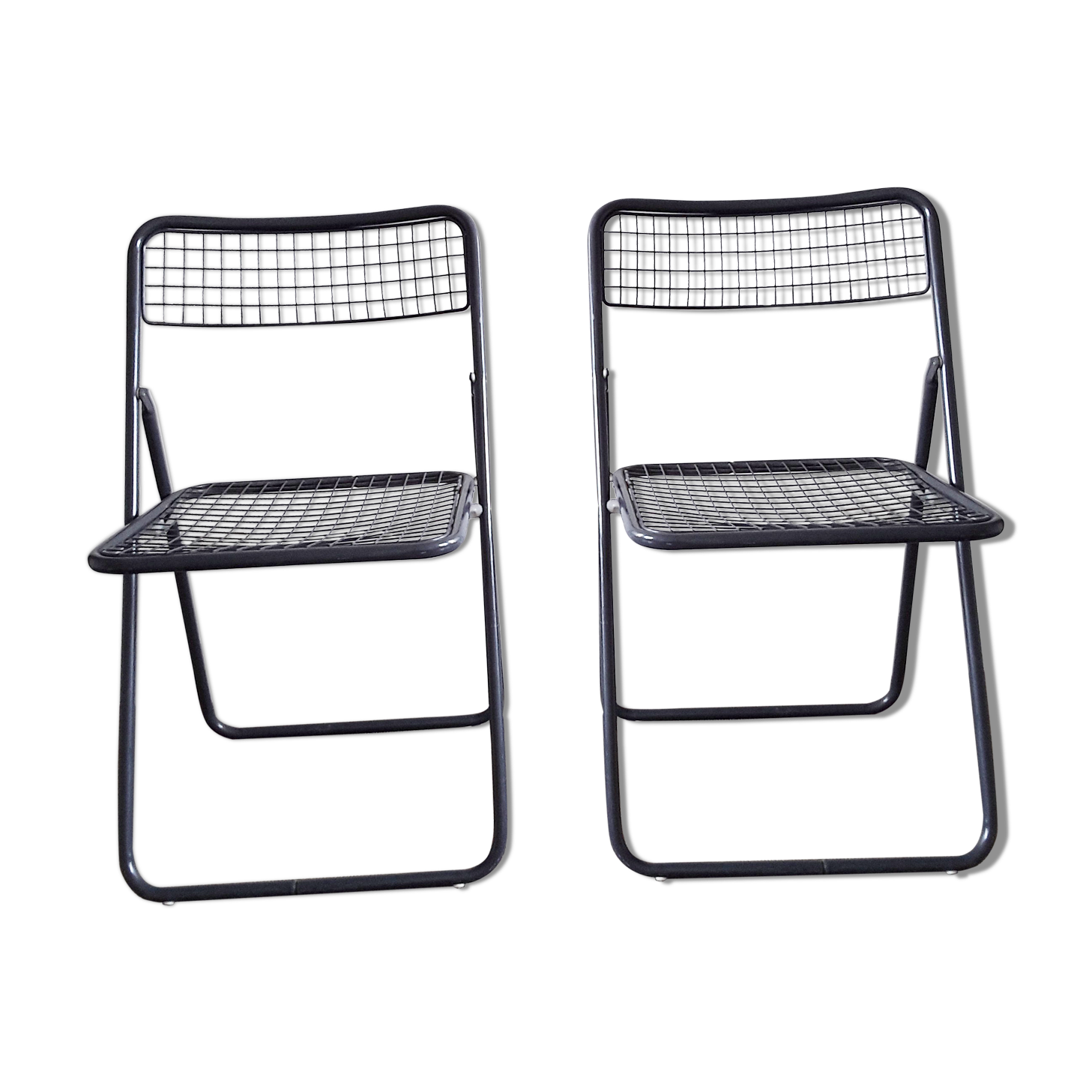Pair of metal folding chairs