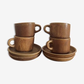 4 stoneware coffee cups and saucers