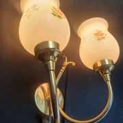 Pair of vintage wall sconces in gilded brass and pink opaline glass.