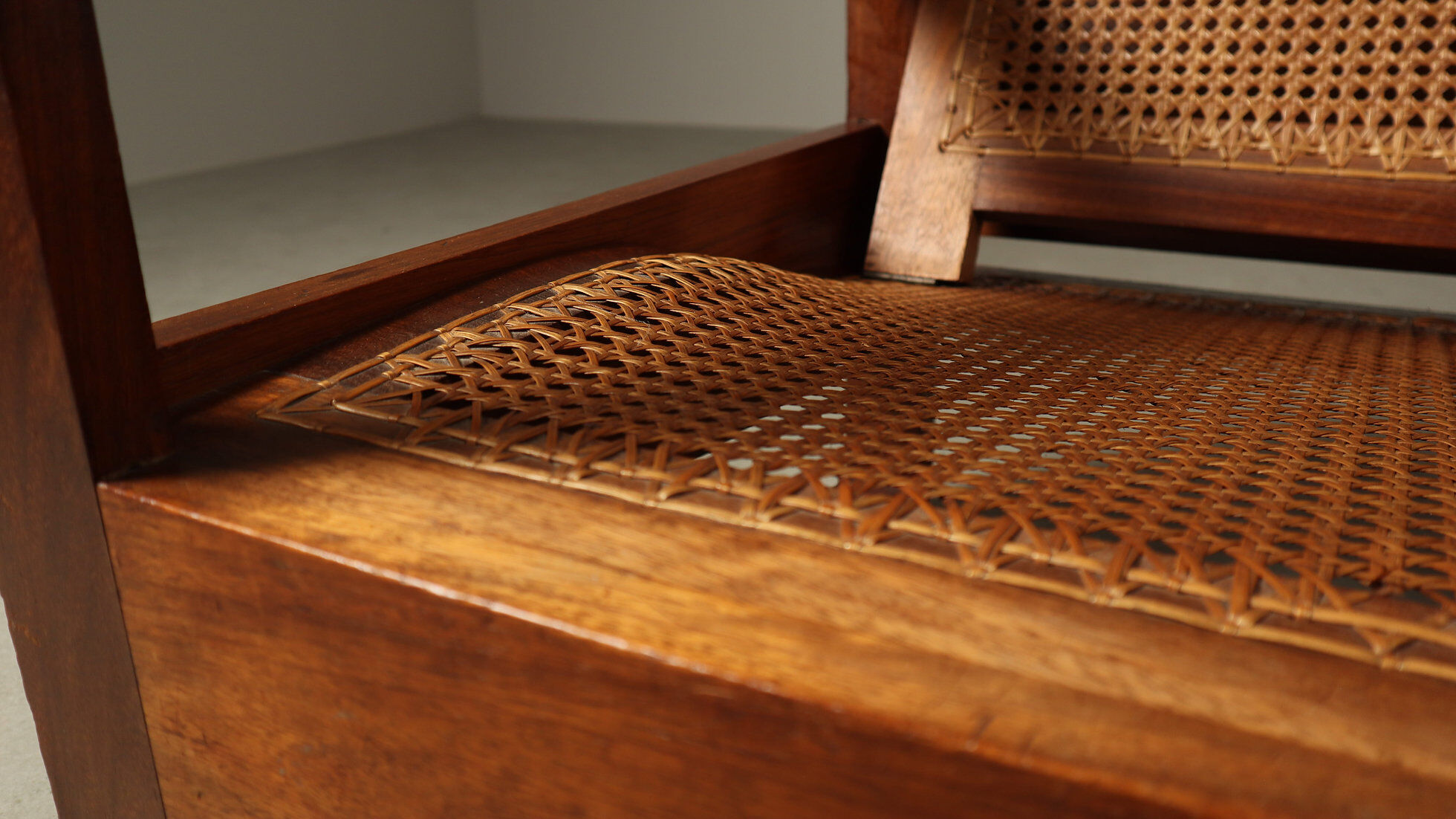 Mid-century architectural teak lounge chair with cane seat, 1950s