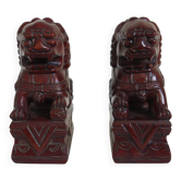 Vintage wooden pair of Foo dogs.