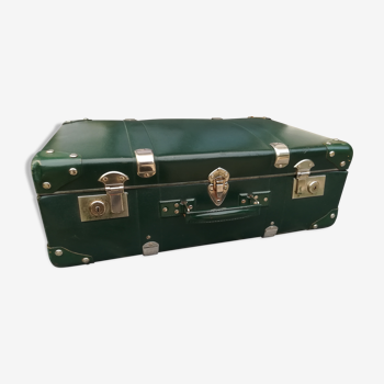 Old green cardboard suitcase